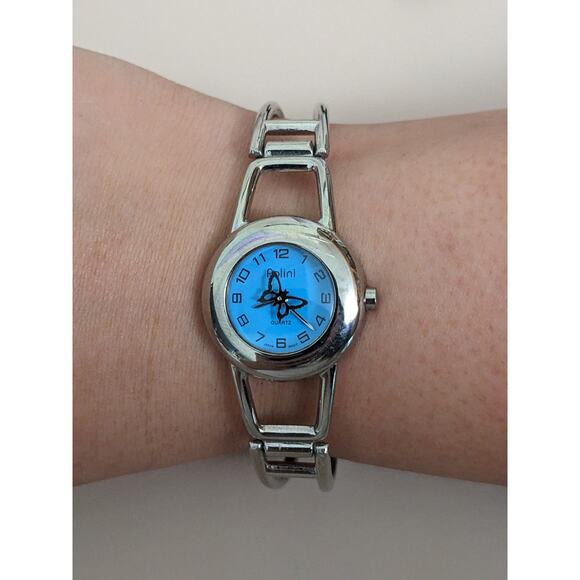 Vintage Y2K Polini Silver Tone Watch with Blue Dial and Rotating Butterfly - Picture 1 of 8
